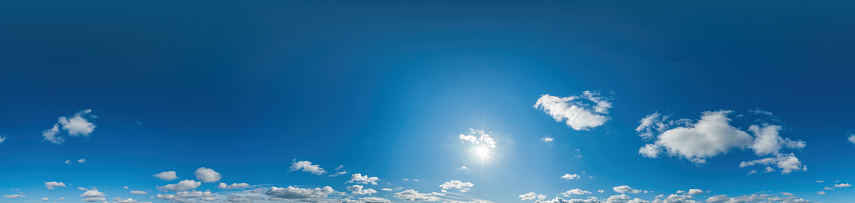 Cloudscape in the bright blue skies over Seattle, Washington USA