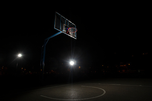 Basketball court during the night.