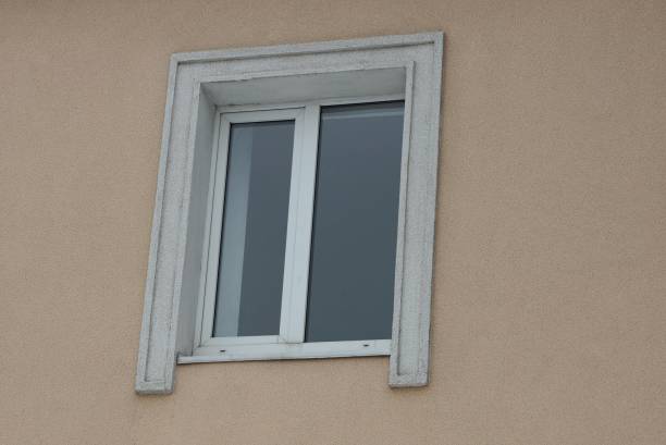 istock one white  large window on the brown concrete wall 1306009794