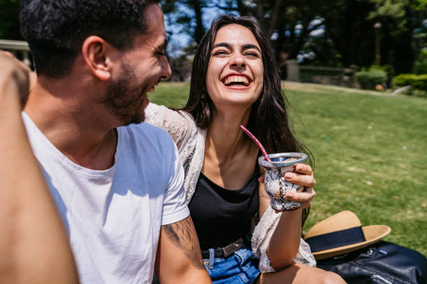 Couple drinking yerba mate on date