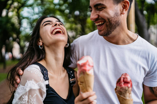 istock Happy couple eating ice cream 1306010928