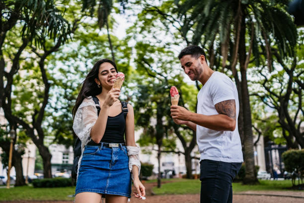 istock Happy couple eating ice cream 1306011044