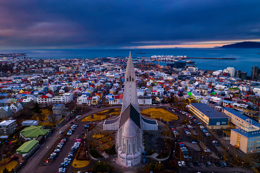 A sunset photo of Reykjavik in Iceland from above and from behind Hallgrimskirkja (the biggest church in Iceland)