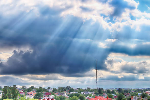 Beautiful view of sun rays through clouds and TV tower in Vinnytsia, Ukraine Beautiful view of sun rays through clouds and TV tower in Vinnytsia, Ukraine vinnytsia photos stock pictures, royalty-free photos & images