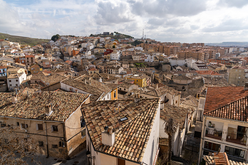 A view of the rooftops and colorful houses of the old city center of Cuenca