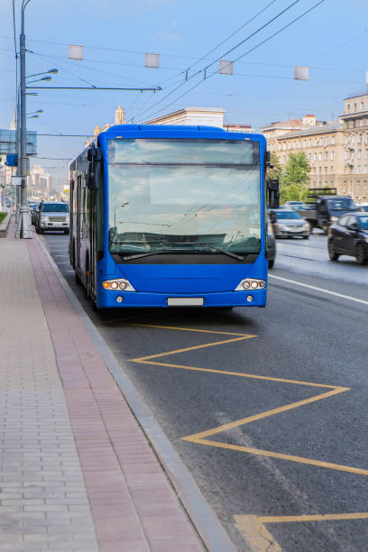 istock Bus at a bus stop in the city 1306017384