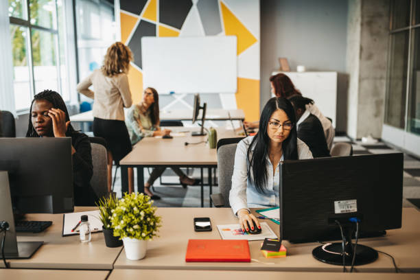 istock Young multi ethnic-group of people working in modern office 1306025151