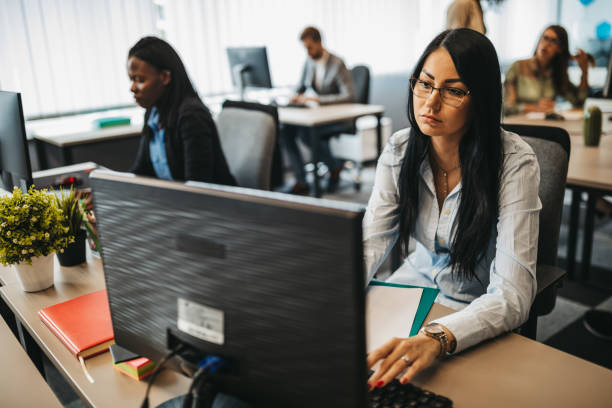istock Young multi ethnic-group of people working in modern office 1306025153