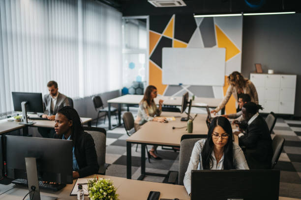 istock Young multi ethnic-group of people working in modern office 1306025252