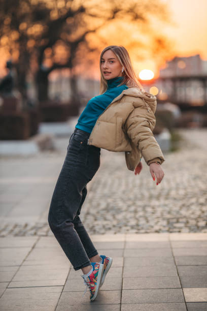 istock Happy woman in city 1306025309