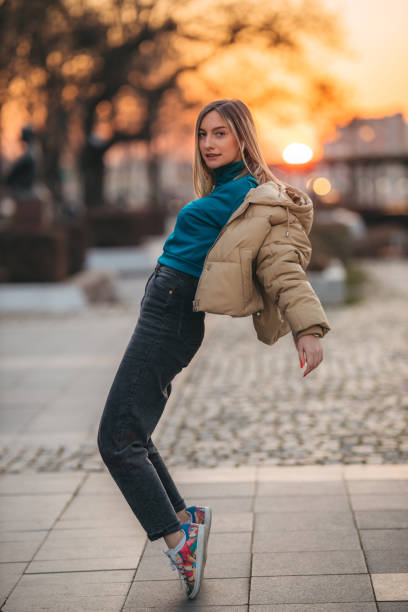 istock Happy woman in city 1306025317