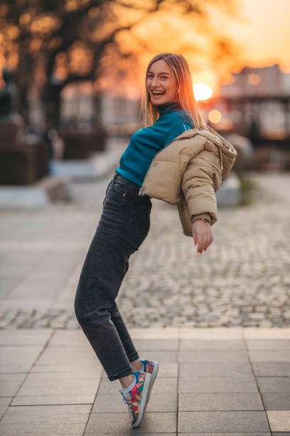 istock Happy woman in city 1306025318