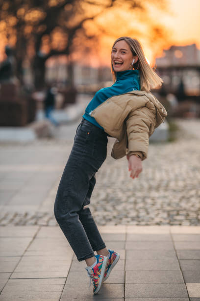 istock Happy woman in city 1306025325