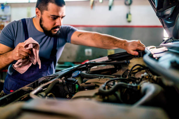 istock Professional mechanic repairing a car 1306026344