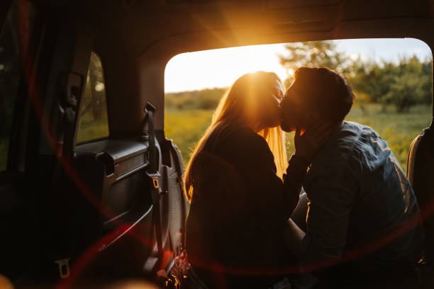 istock Kiss under perfect sunset 1306027194