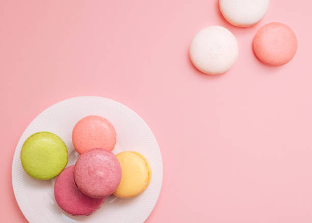 istock Macaroons Top view photo for posters and banners with copy space 1306028480
