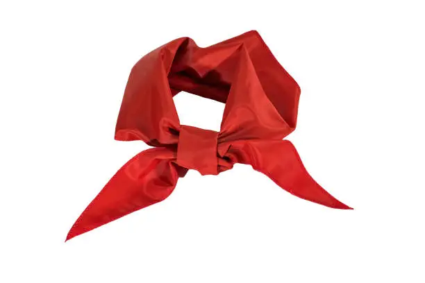 Silk scarf or red tie isolate on white background close-up.