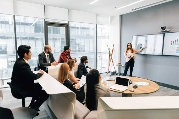 istock Businesswoman making a presentation to the team 1306032077