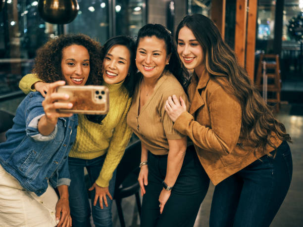 istock Multi Ethnic Group of Friends in an Indian Restaurant 1306032572