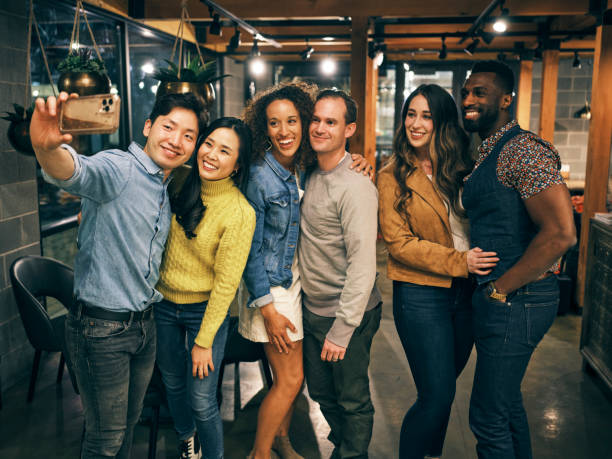 istock Multi Ethnic Group of Friends in an Indian Restaurant 1306033094