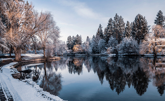 Early morning in the winter on Mirror Pond on the Deschutes River as it flows through Bend, Oregon