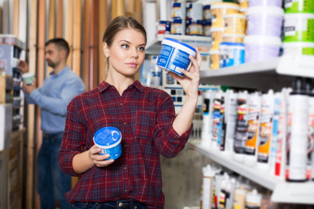 istock Female designer is looking paint 1306038473