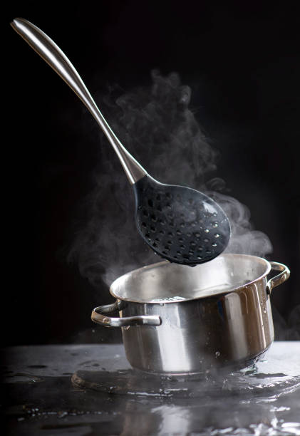 istock splash of water in a pan. Abstract background 1306039614
