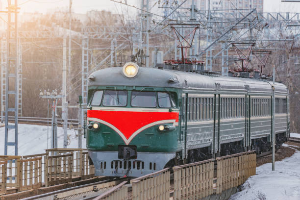 istock Retro passenger train approaches to the station. Moscow. 1306040487