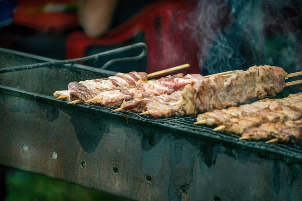 istock Roasted meat shashlyk cooked on barbeque grill. 1306042305