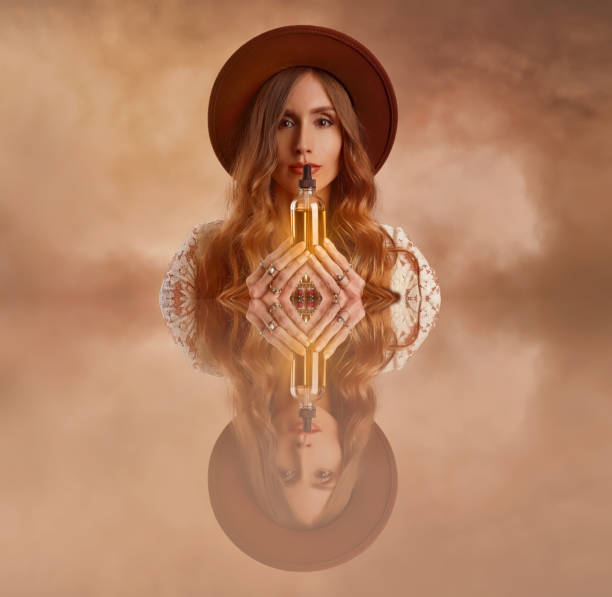 istock Boho woman holding CBD Oil 1306049120