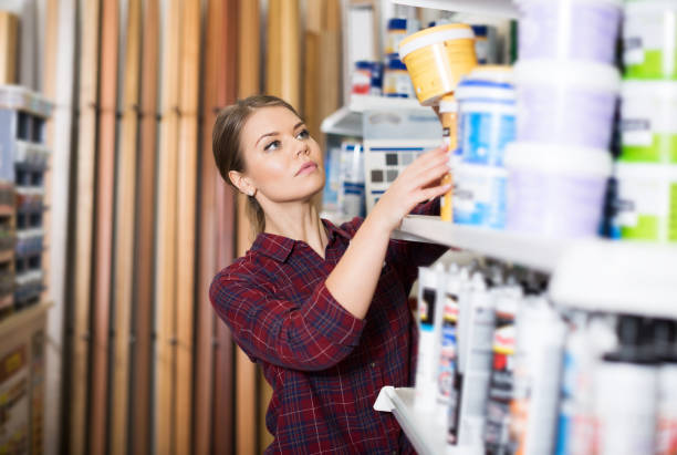 istock Female designer is looking paint 1306050187