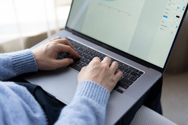 istock Asian businessman working at home with laptop 1306051121
