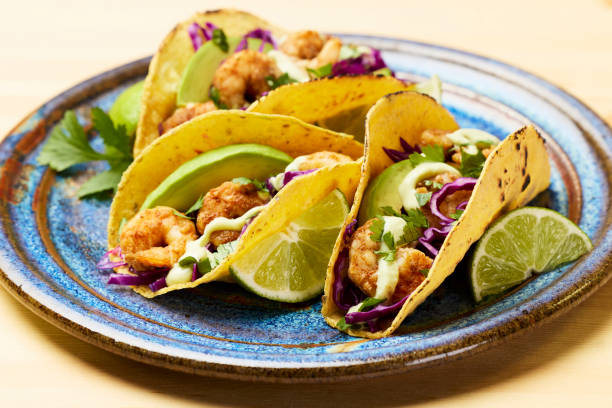 istock Shrimp tacos with red cabbage and avocado 1306051187