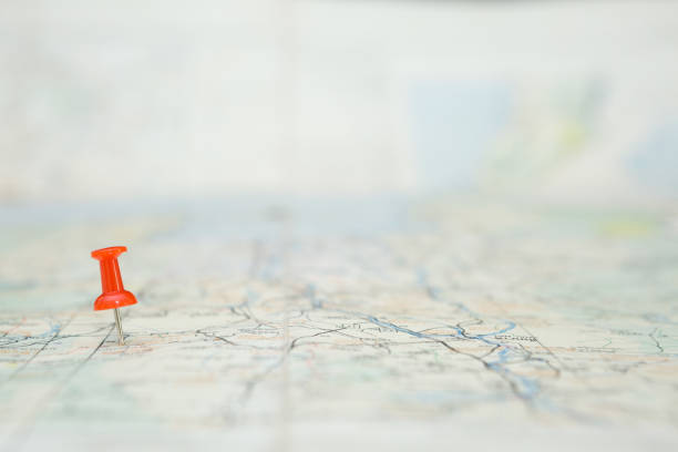 istock Selective focus of Red pin on map background 1306052846
