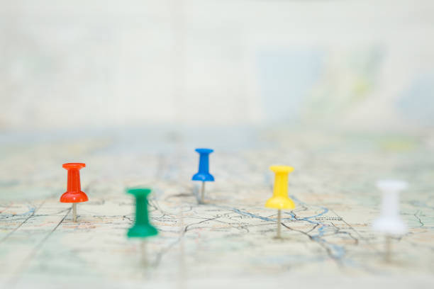 istock Selective focus of Colorful Many pins on map background 1306052848