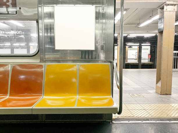 istock Subway seats and blank billboard 1306052882