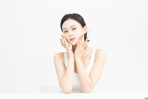 Young Asian women, skin care, face cream