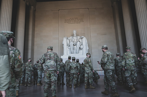 Washington DC, USA - January 22, 2021: Members of the Kentucky National Guard deployed to Washington DC visit the Lincoln Memorial during a day off.
