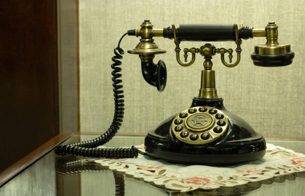 istock Antique Telephone on Table at Hotel Lobby 1306067308
