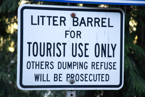 istock View of sign Litter Barrel for Tourist Use only, Others dumping refuse will be prosecuted in Strathcona Provincial Park 1306071494