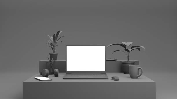istock 3D render. Grey, monochromatic office table with laptop and phone. Mock-up. 1306079625