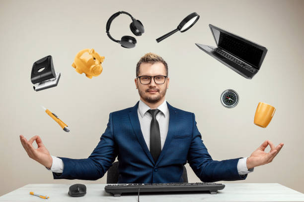 istock Businessman with many hands in a suit. Works simultaneously with several objects, a mug, a magnifying glass, papers, a contract, a telephone. Multitasking, efficient business worker concept. 1306079973