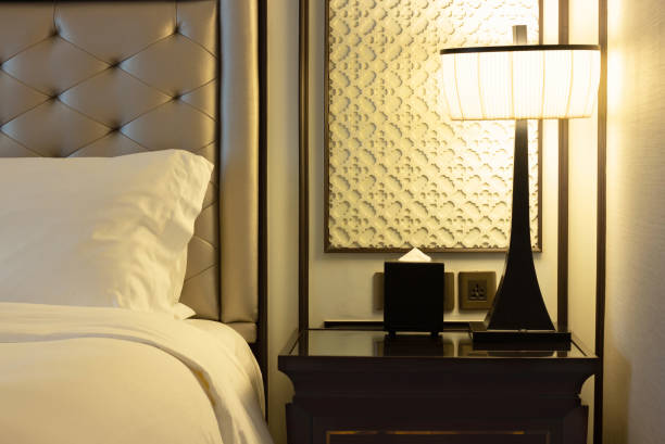 istock Luxury Modern Bedroom Interior with Pillow and Table Lamp 1306081894
