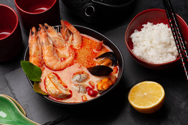 istock Traditional Thai soup Tom Yum and rice bowl 1306081937