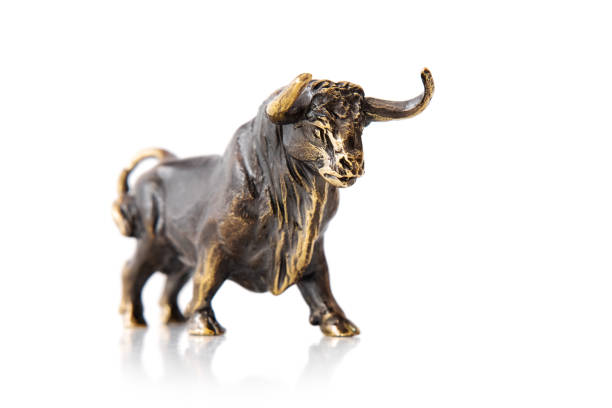 istock Bull figurine isolated on white background 1306082115