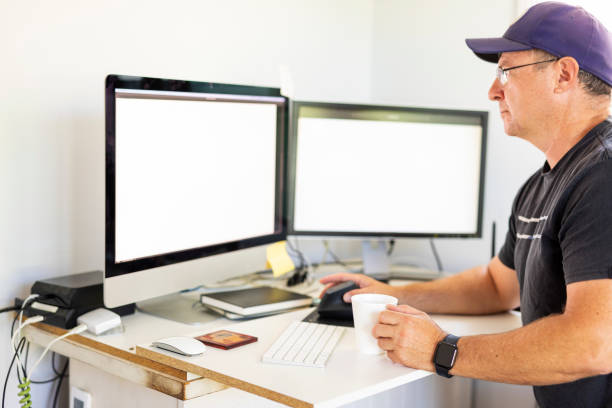 Creative Businessman Working From Home With a Stand Up Desk