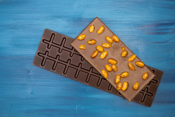istock many different tasty chocolate bars on blue background 1306083950