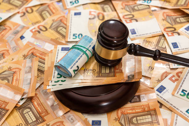 istock hammer and many 50 euro bills 1306084215