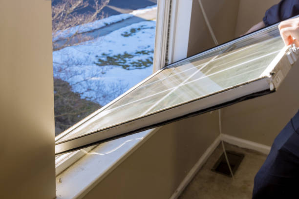 istock Professional master for removed break window in house during home renovation 1306089466