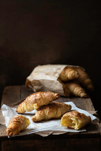 Croissant on a rustic background